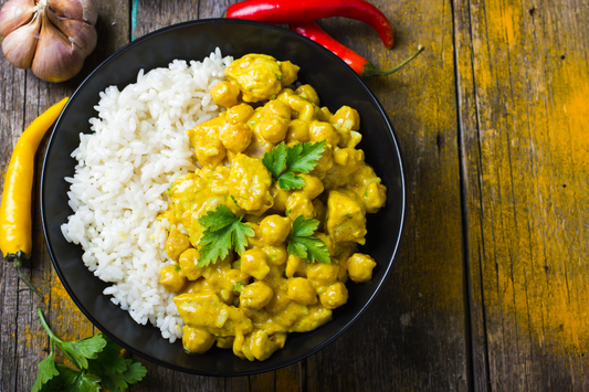 Turmeric chickpea curry with rice in a bowl.