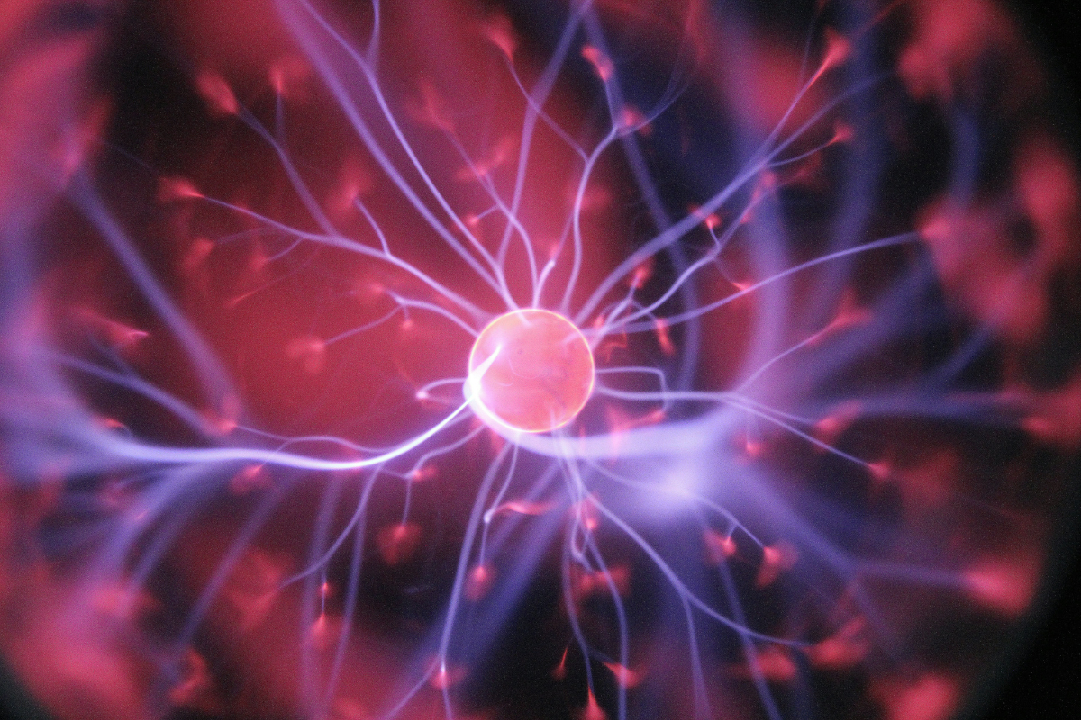 Synaptic connection against purple background.