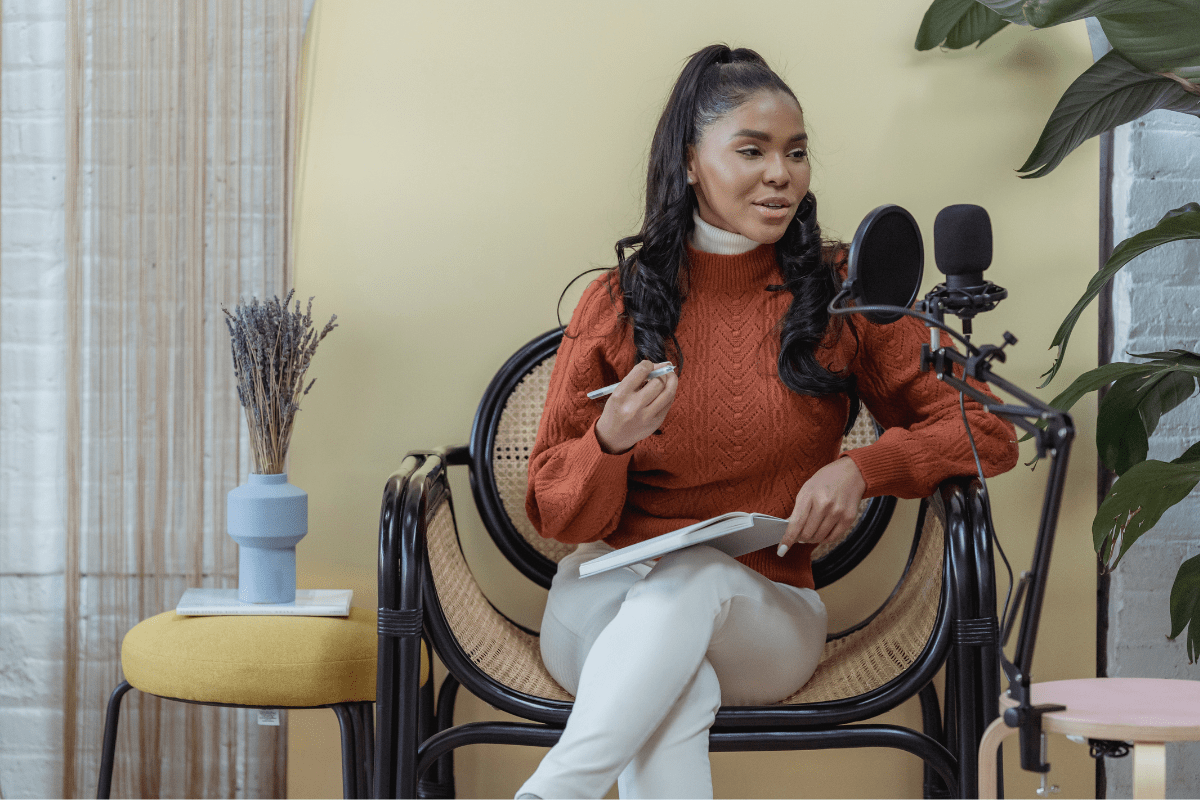 Woman recording a podcast.
